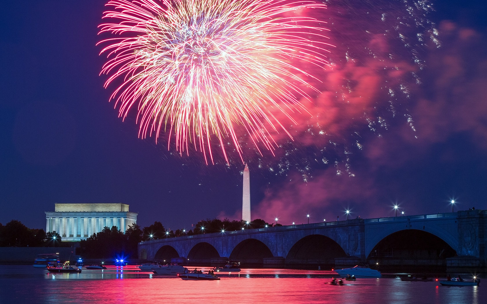 July 4th Fireworks over the Potomac River with the Lincoln Memorial, Washington Monument and Arlington Bridge in the background