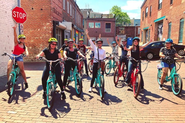 Tour group on bikes in Blagden Alley in Washington, DC 